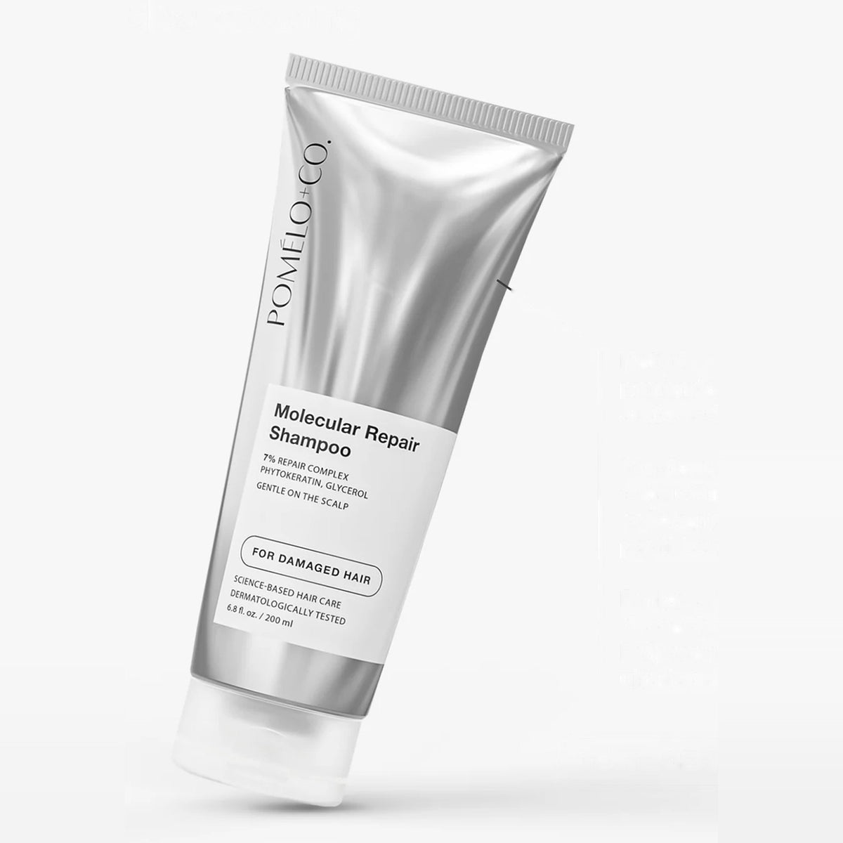 Tube argenté du shampooing Molecular Repair de Pomélo+Co
